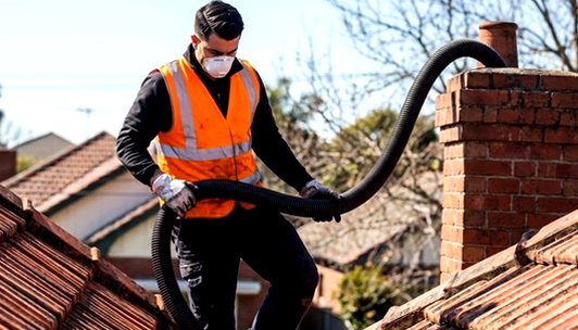 Vacuum hose run along the roof ridge