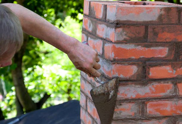 Mortar joint tooled clean along chimney brick
